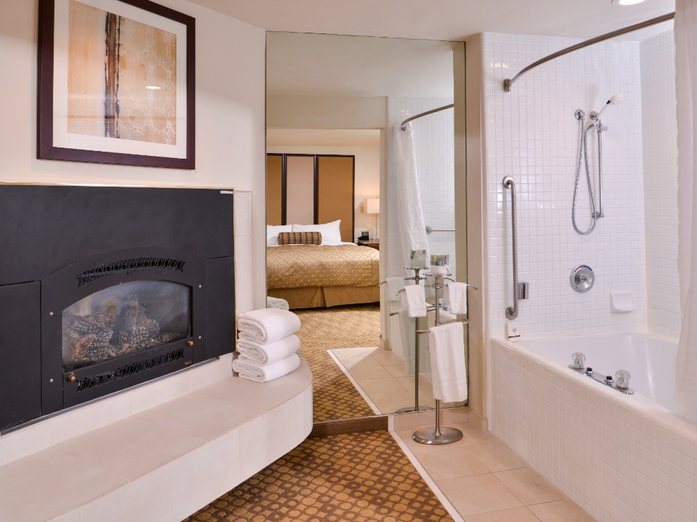 Hotel bedroom with fireplace