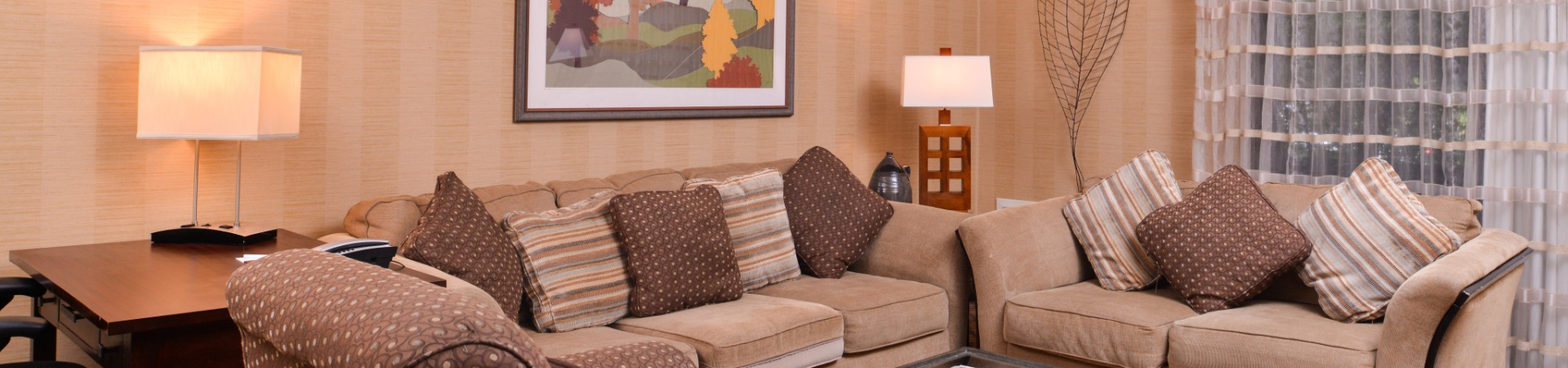 Hotel living room area with couches